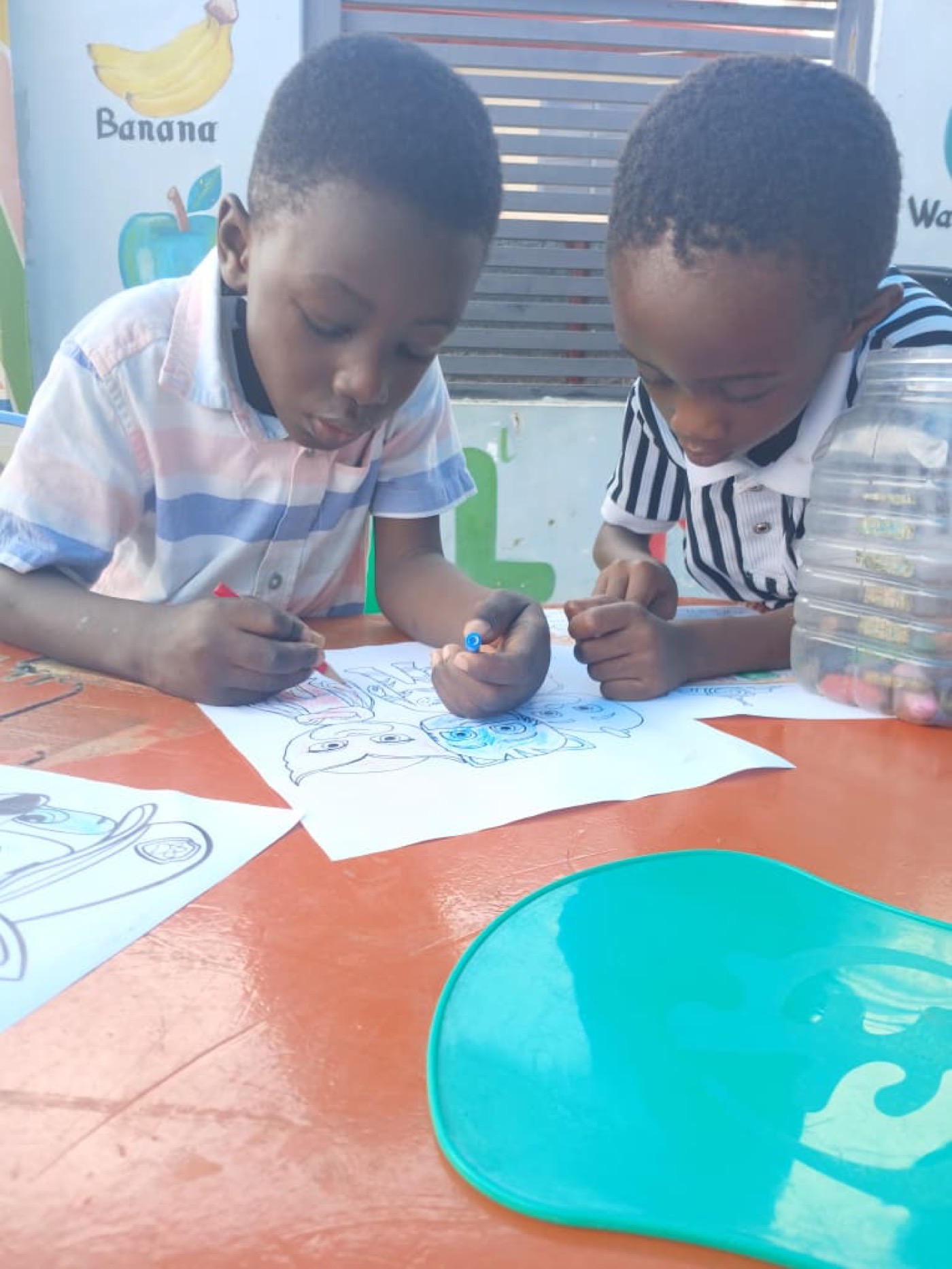 Pupils colouring together