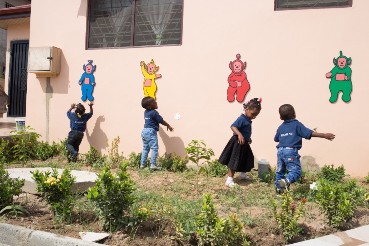 Our little ones outside the nursery wall